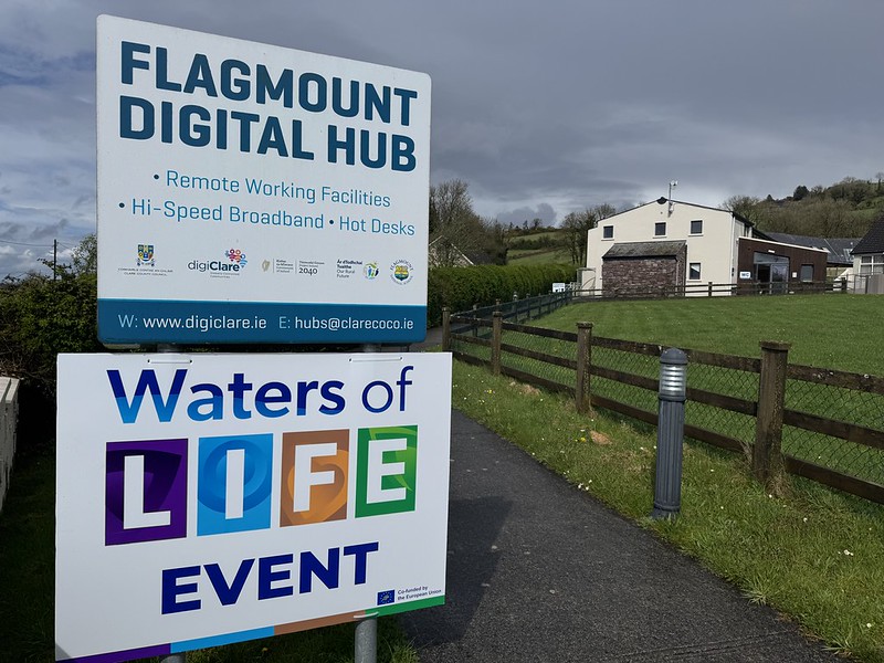 Signage of Flagmount Digital Hub and a Waters of LIFE event